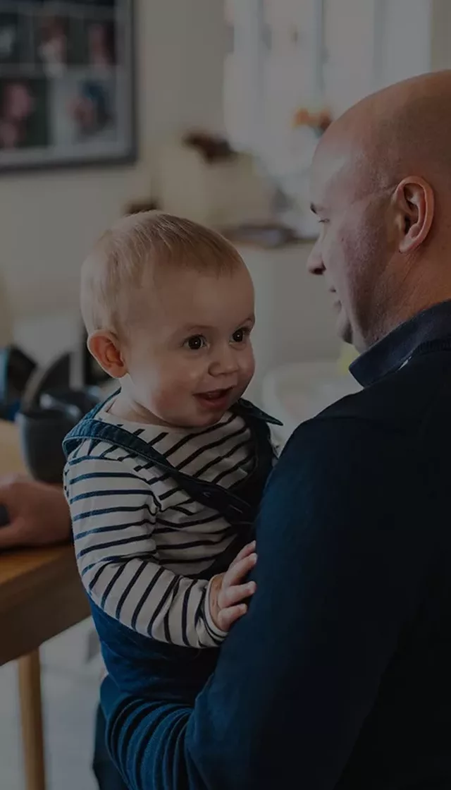 Father baby working from home