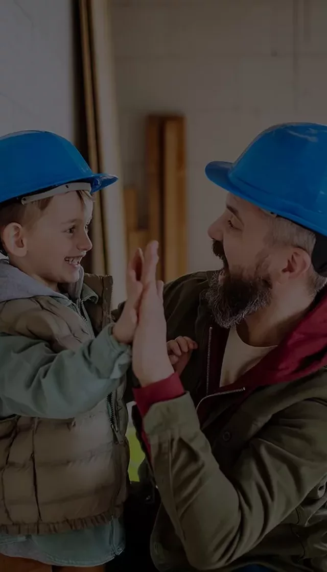 Father little son working their house